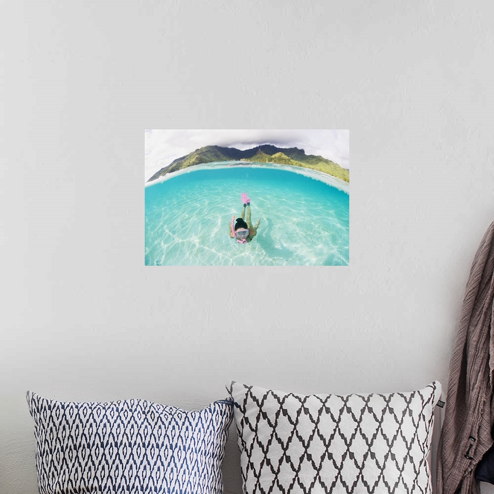A bohemian room featuring French Polynesia, Moorea, Woman Free Diving In Turquoise Ocean