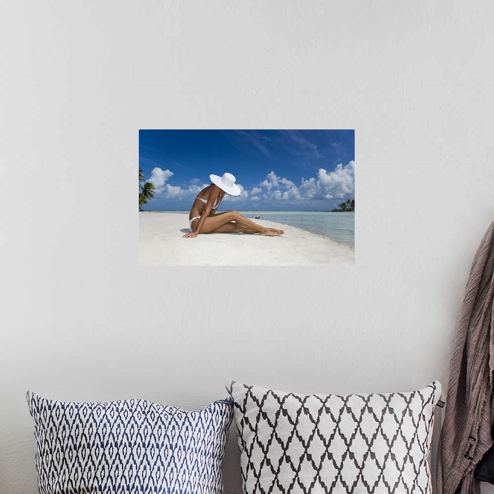 A bohemian room featuring French Polynesia, Tuamotu Islands, Rangiroa Atoll, Woman Sitting On White Sand Beach