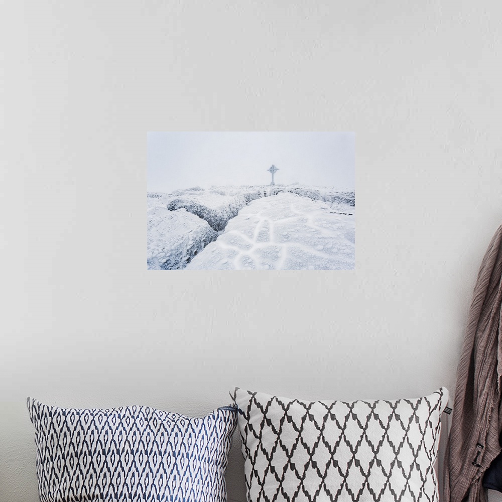 A bohemian room featuring Frozen ice formations on the summit of Galtymor mountain with a celtic cross in winter, Galty Mou...