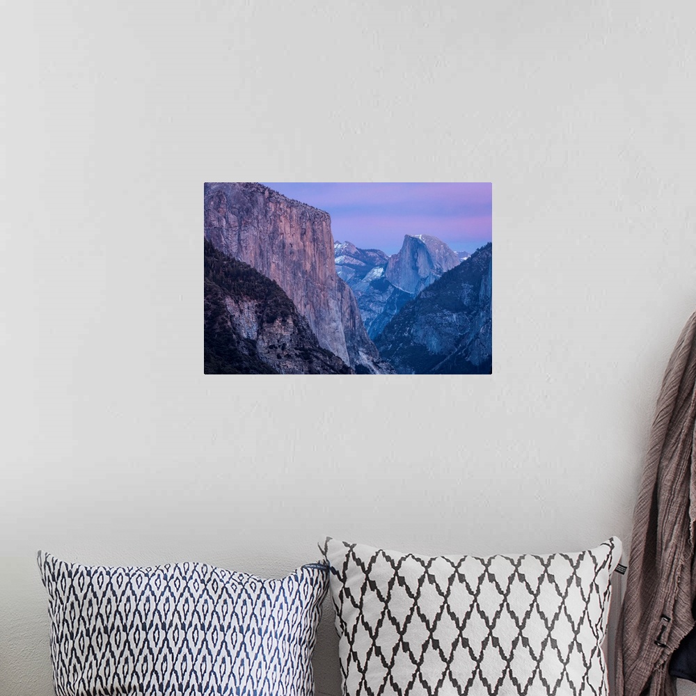 A bohemian room featuring Shades of pink and lavender are reflected on El Capitan, Half Dome and winter clouds at dusk in Y...