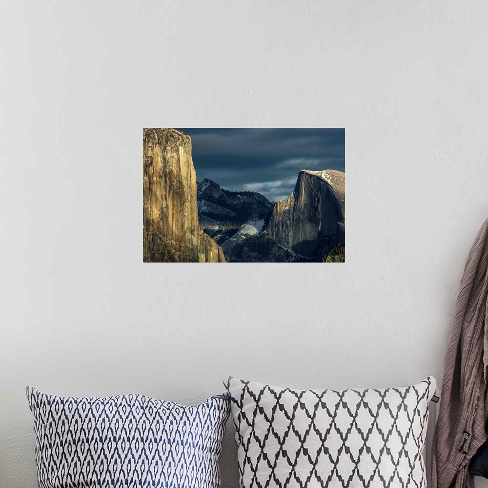 A bohemian room featuring El Capitan and Half Dome in late afternoon winter light, as seen from Turtleback Dome in Yosemite...