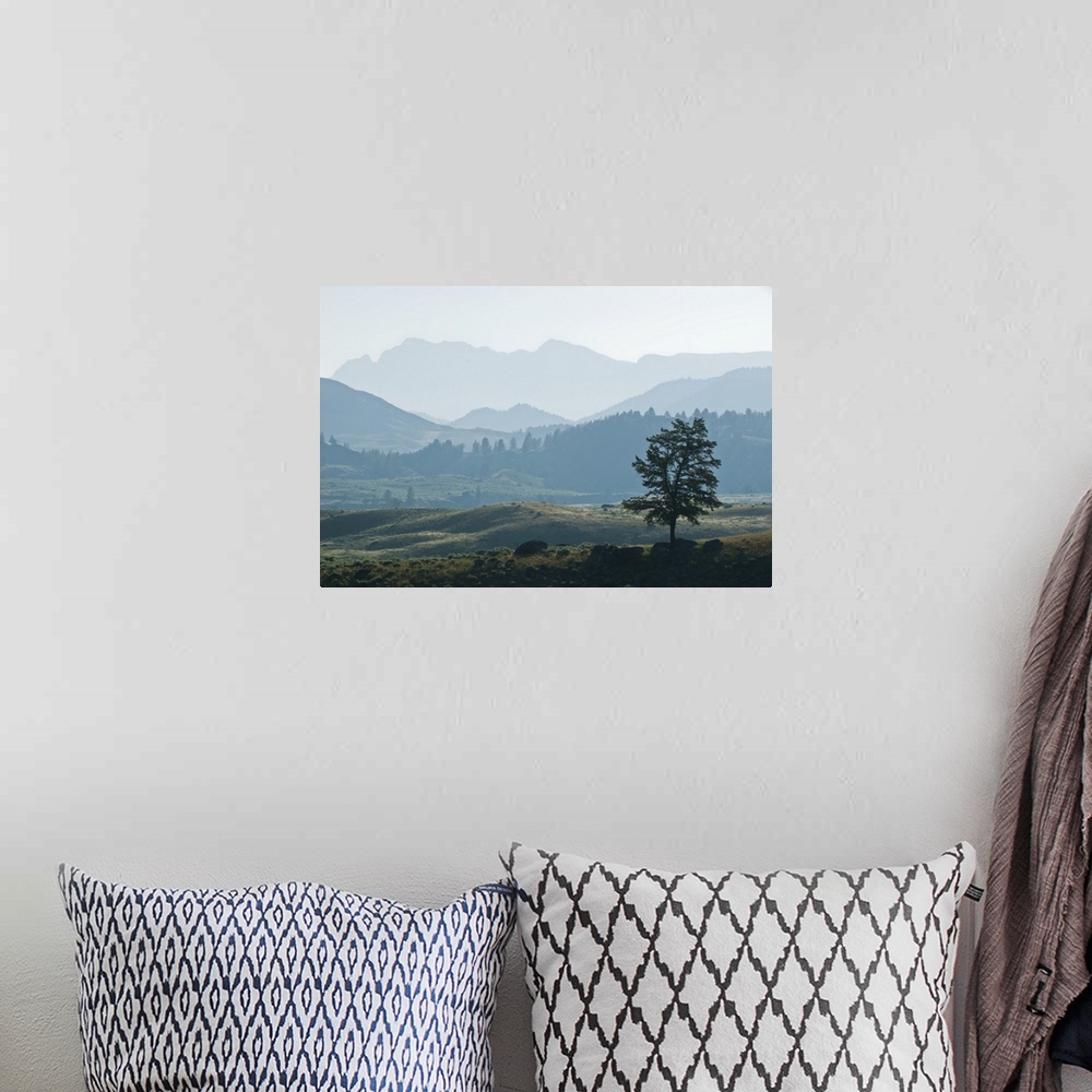 A bohemian room featuring Haze over the silhouetted Absaroka Range and Lamar Valley, Yellowstone National Park, United Stat...