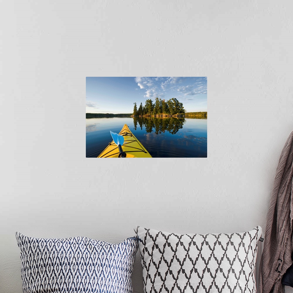 A bohemian room featuring Kayak On Lake In Northwestern Ontario, Lake Of The Woods, Ontario, Canada
