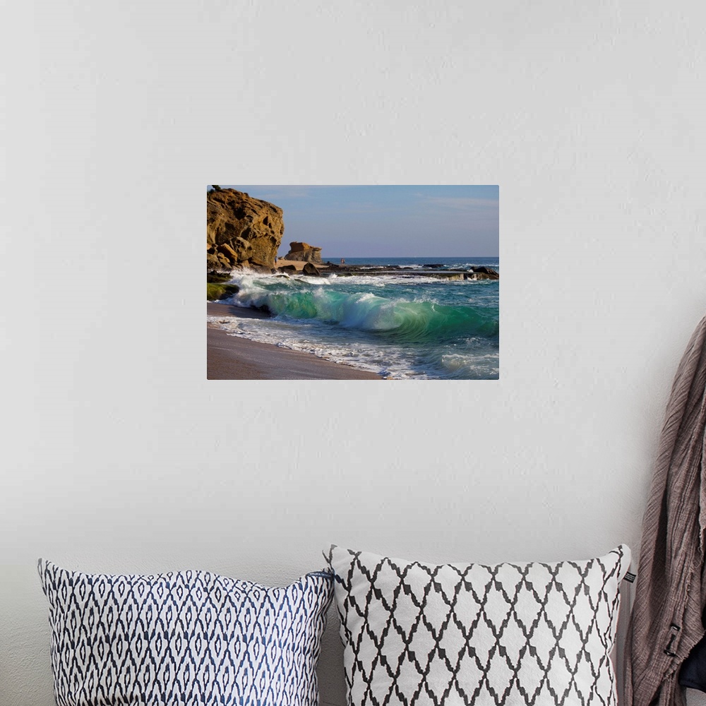 A bohemian room featuring Laguna beach shore break and waves.