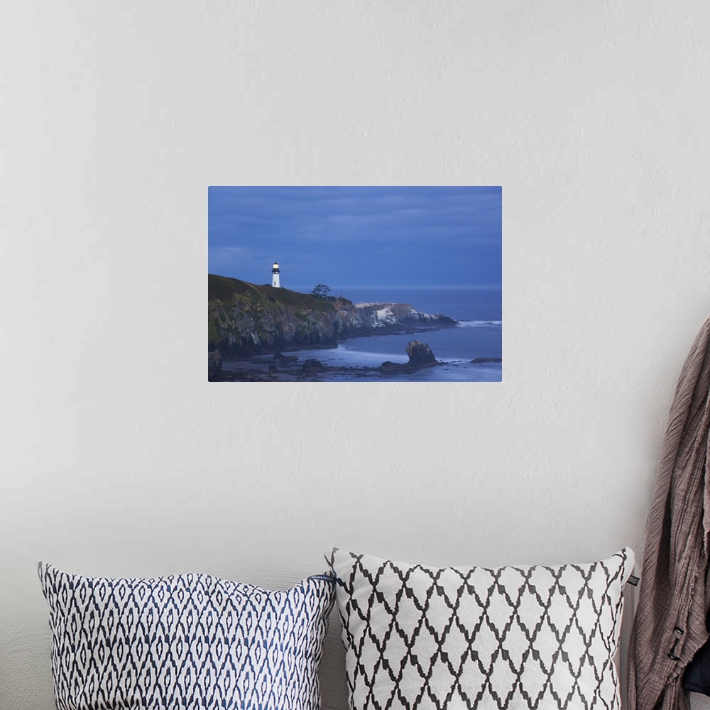 A bohemian room featuring Morning Light Over Yaquina Head Lighthouse; Newport, Oregon, USA