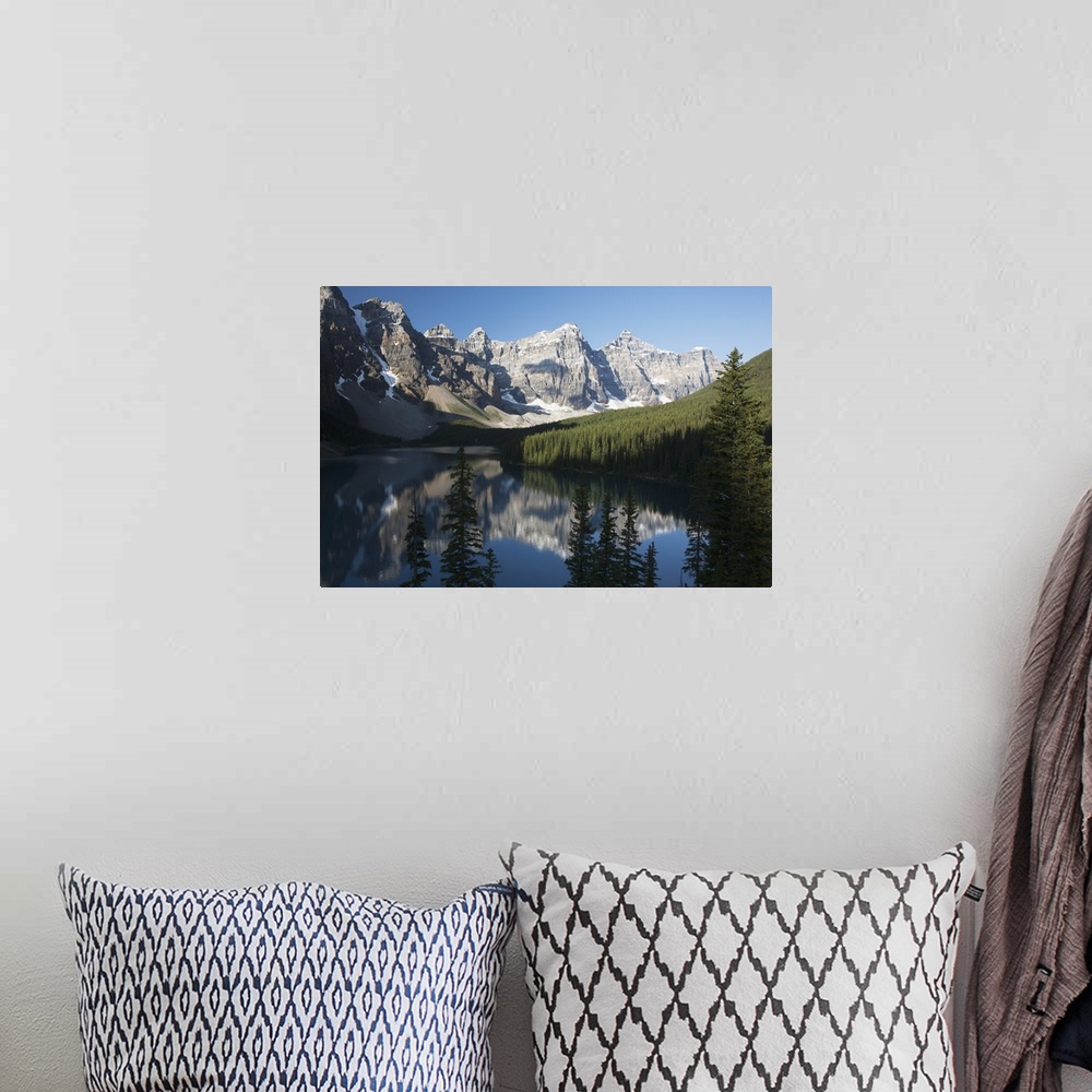 A bohemian room featuring Mountain Range And Lake Reflection With Blue Sky; Alberta, Canada