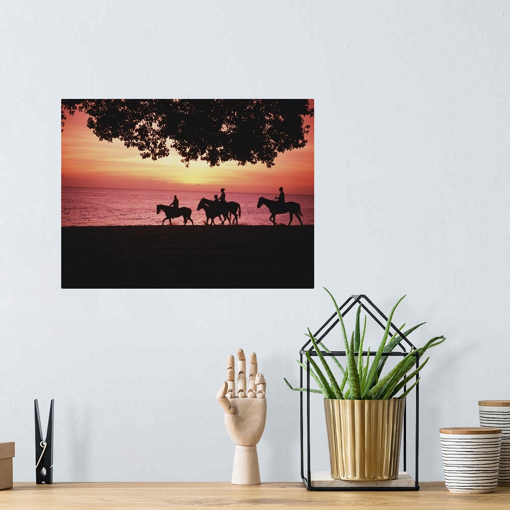 A bohemian room featuring Riding Horses On The Beach At Sunset