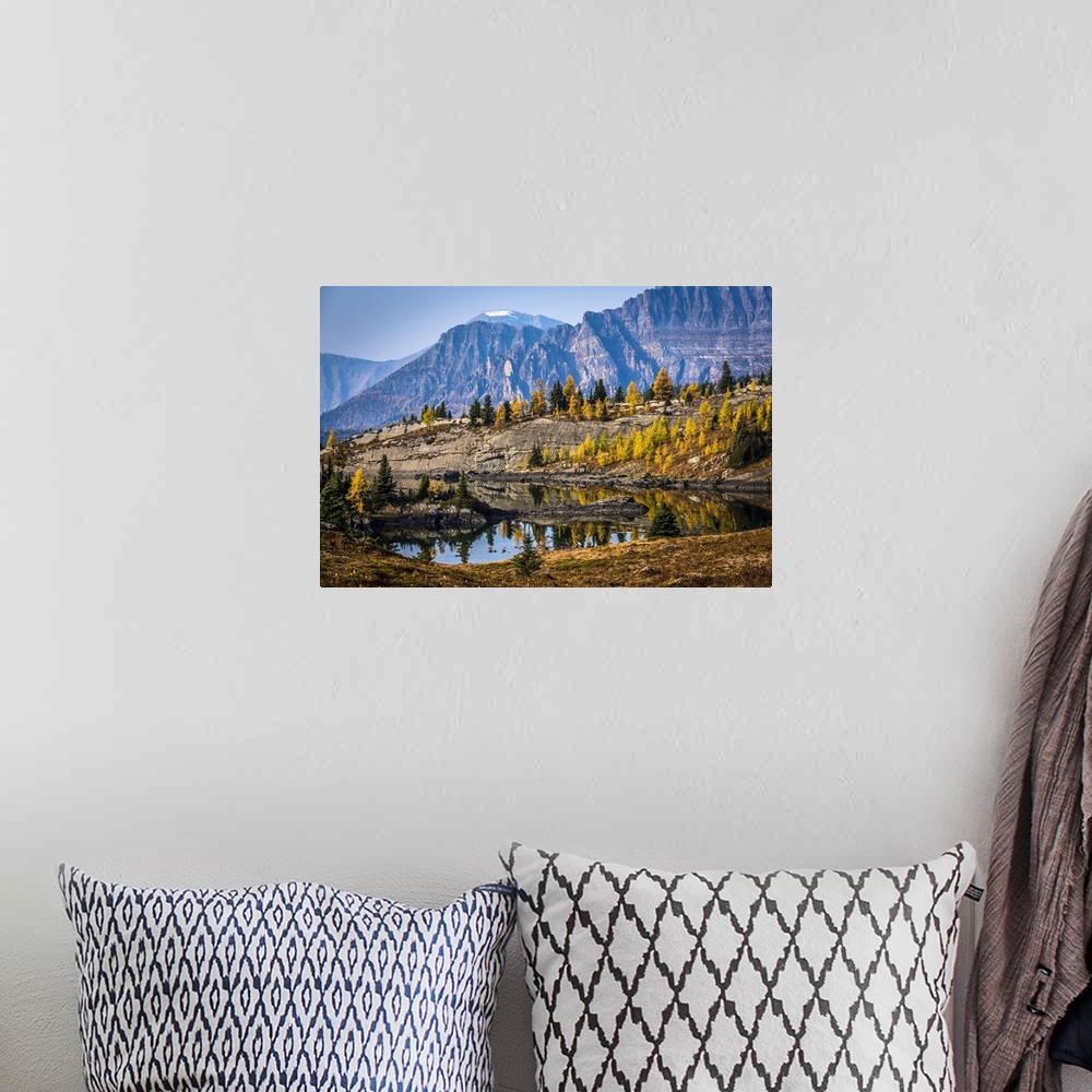 A bohemian room featuring Rock Isle Lake in Autumn with Mountain Range in Background, Mount Assiniboine Provincial Park, Br...
