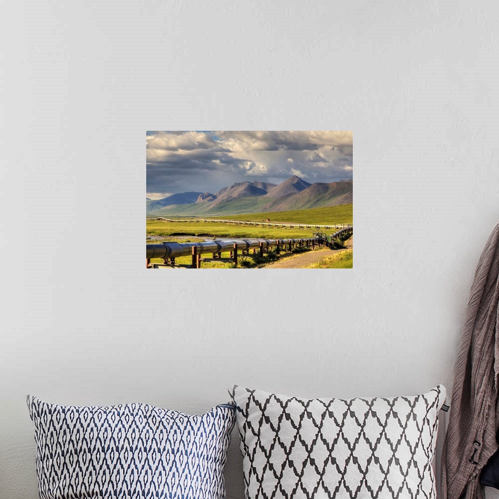 A bohemian room featuring Semi truck driving the Haul Road (James Dalton Highway) along the Trans Alaska Oil Pipeline on th...
