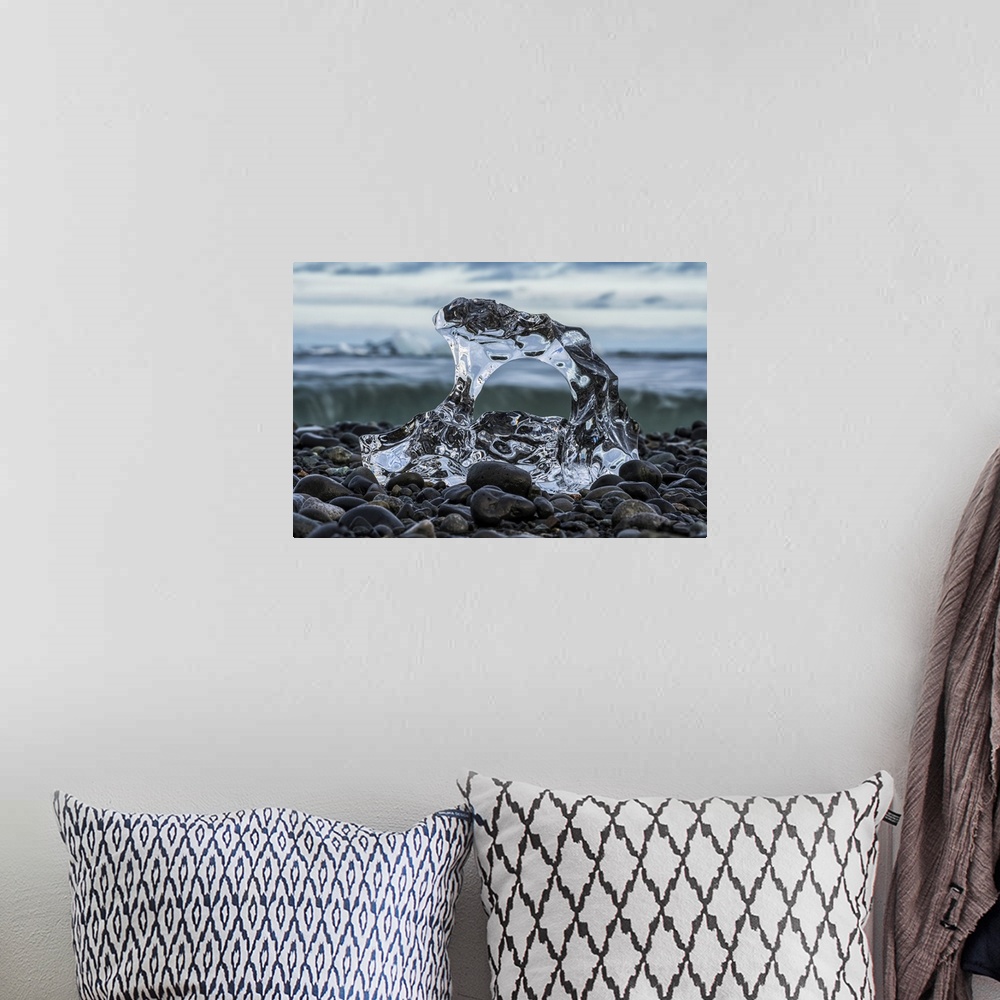 A bohemian room featuring Small piece of melted glacial ice on the shore of the ocean near Jokulsarlon, South Coast of Icel...