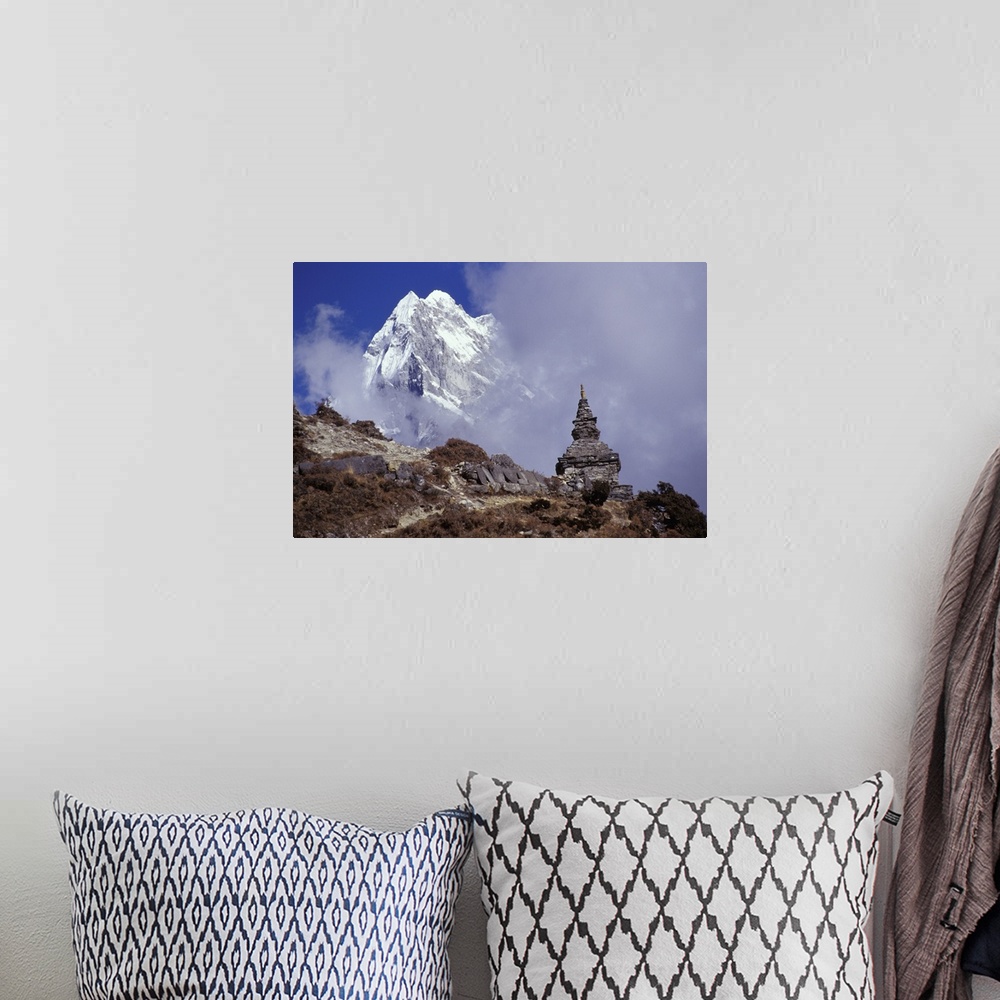 A bohemian room featuring Snow Covered Peak With Nepalese Monument