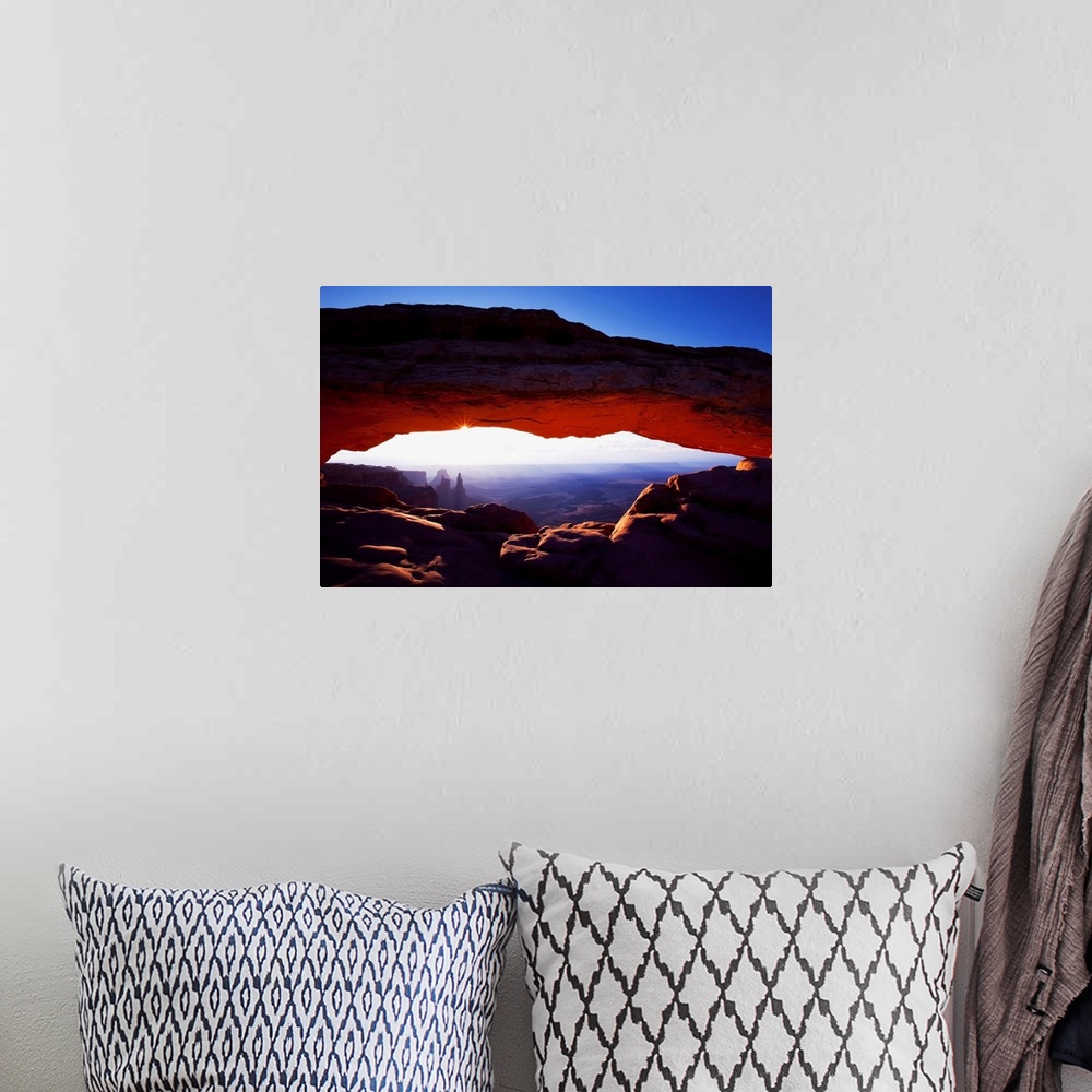 A bohemian room featuring Sunrise At Mesa Arch, Utah