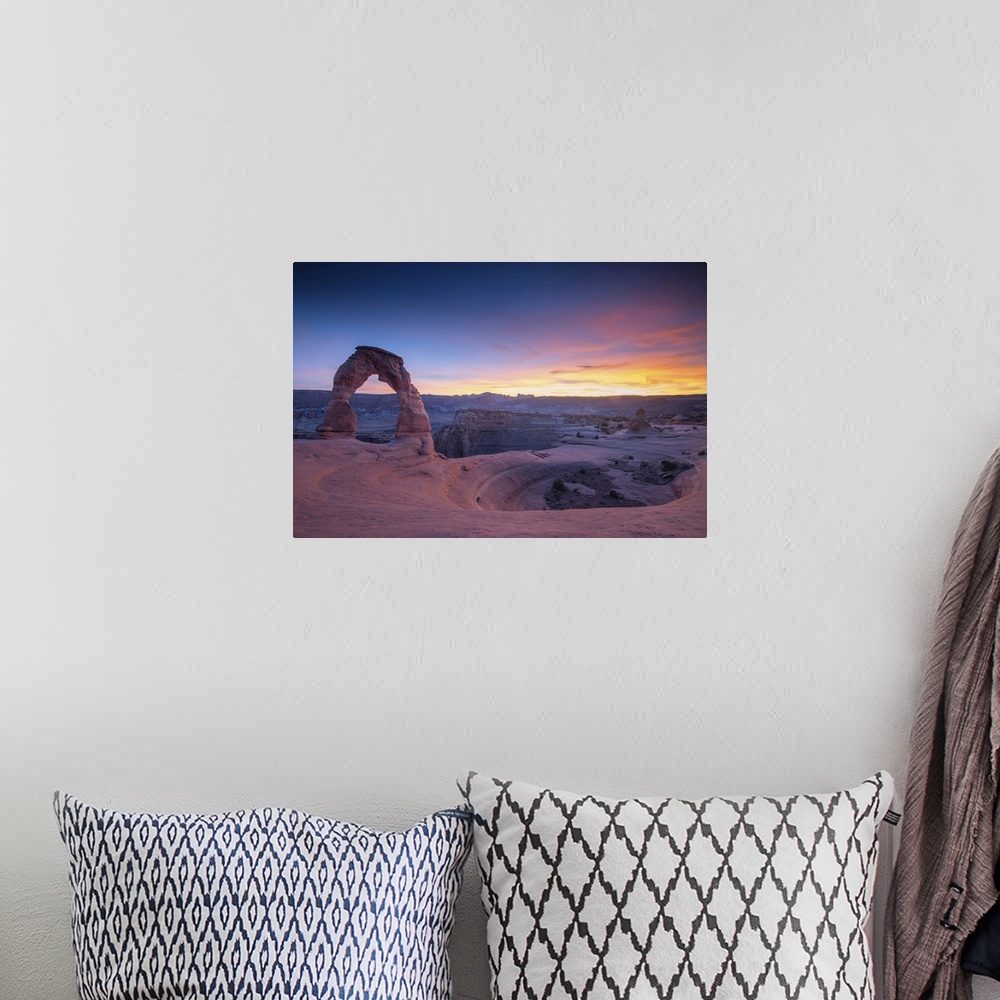 A bohemian room featuring Sunset at Delicate Arch, located in Arches National Park, Utah