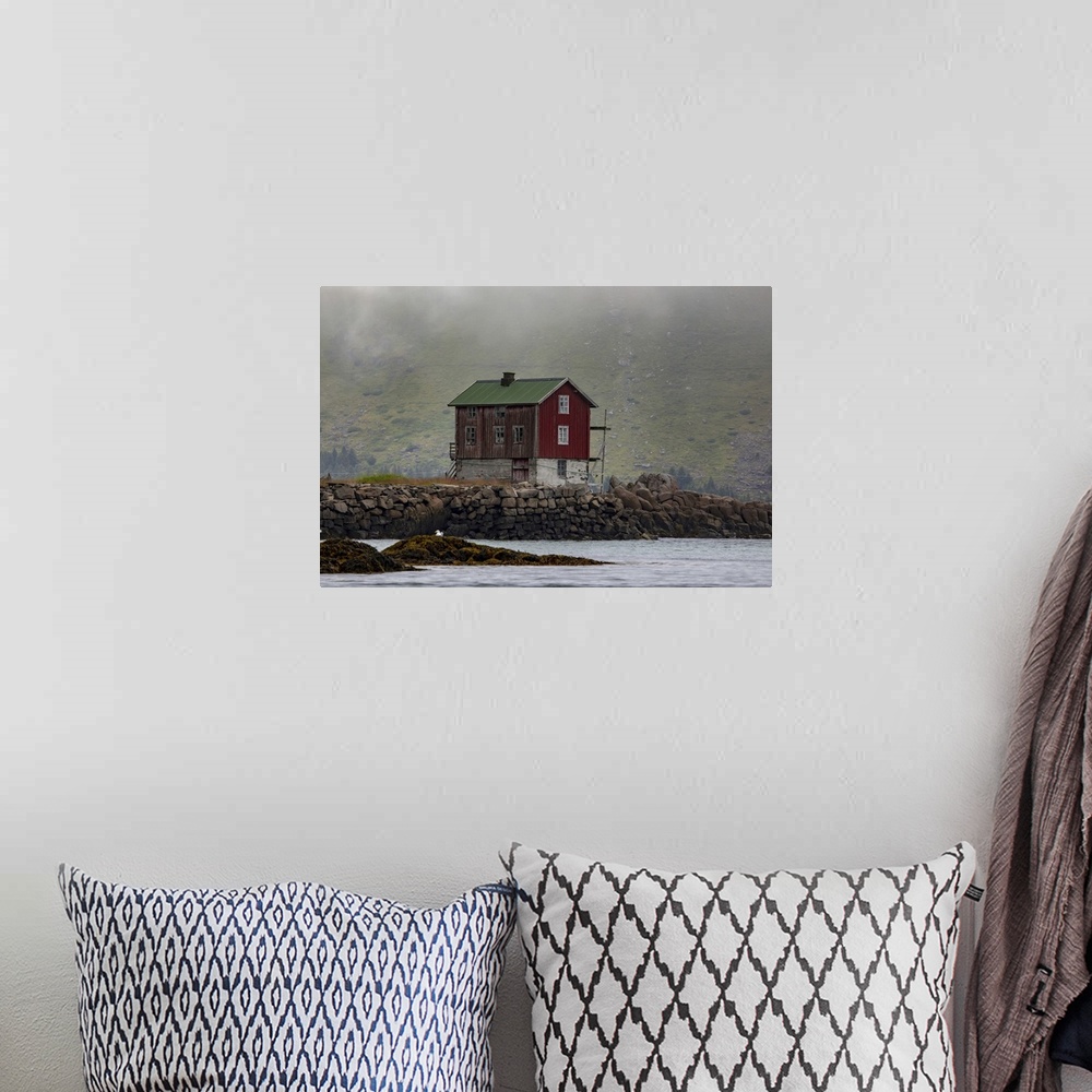 A bohemian room featuring Traditional fishing village house next to the shoreline in Lofoten, Lofoten, Arctic Circle, Norway