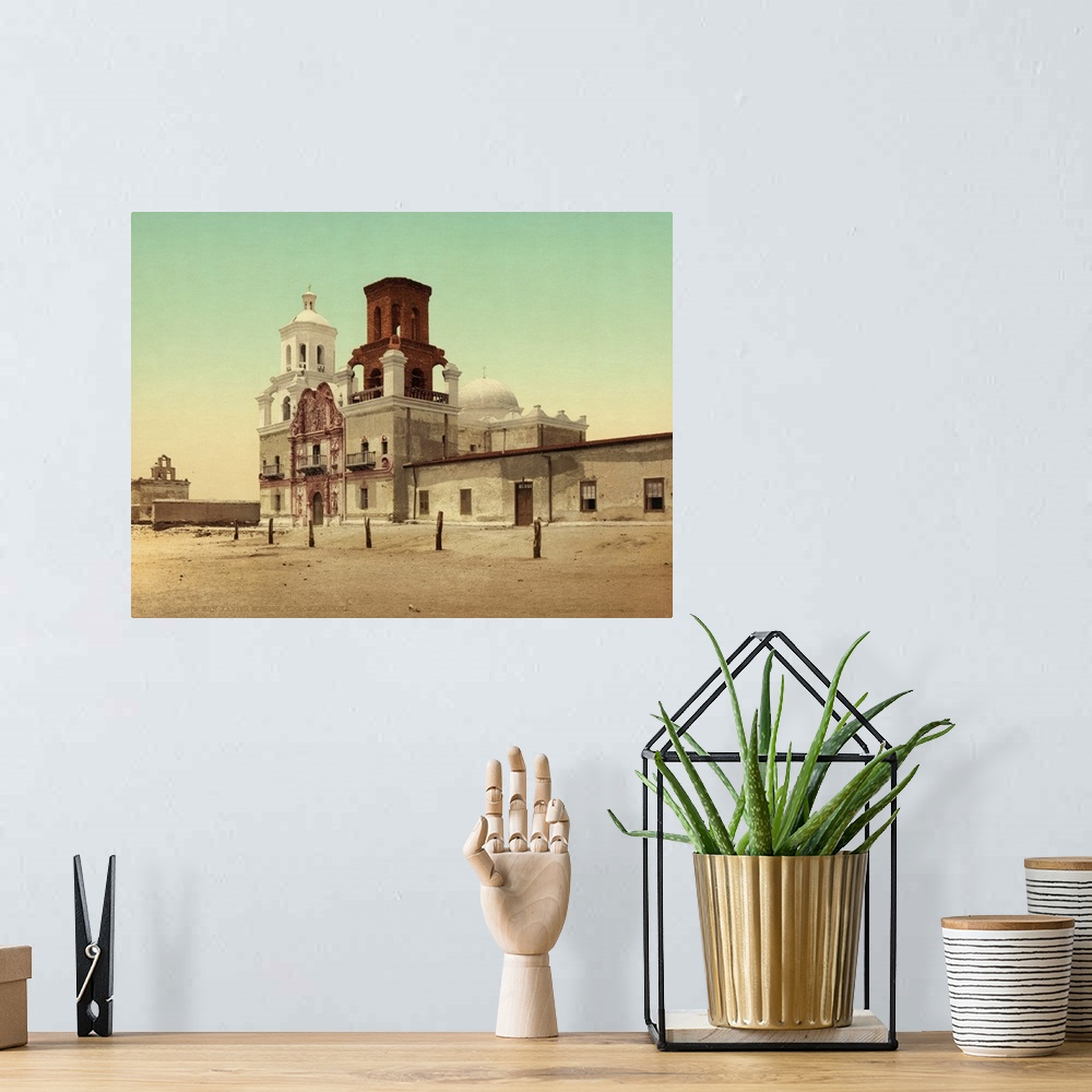 A bohemian room featuring Hand colored photograph of San Xavier mission, Tucson, Arizona.