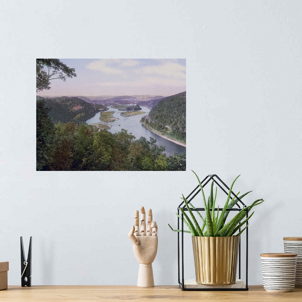 A bohemian room featuring Up the Delaware from the Water Gap