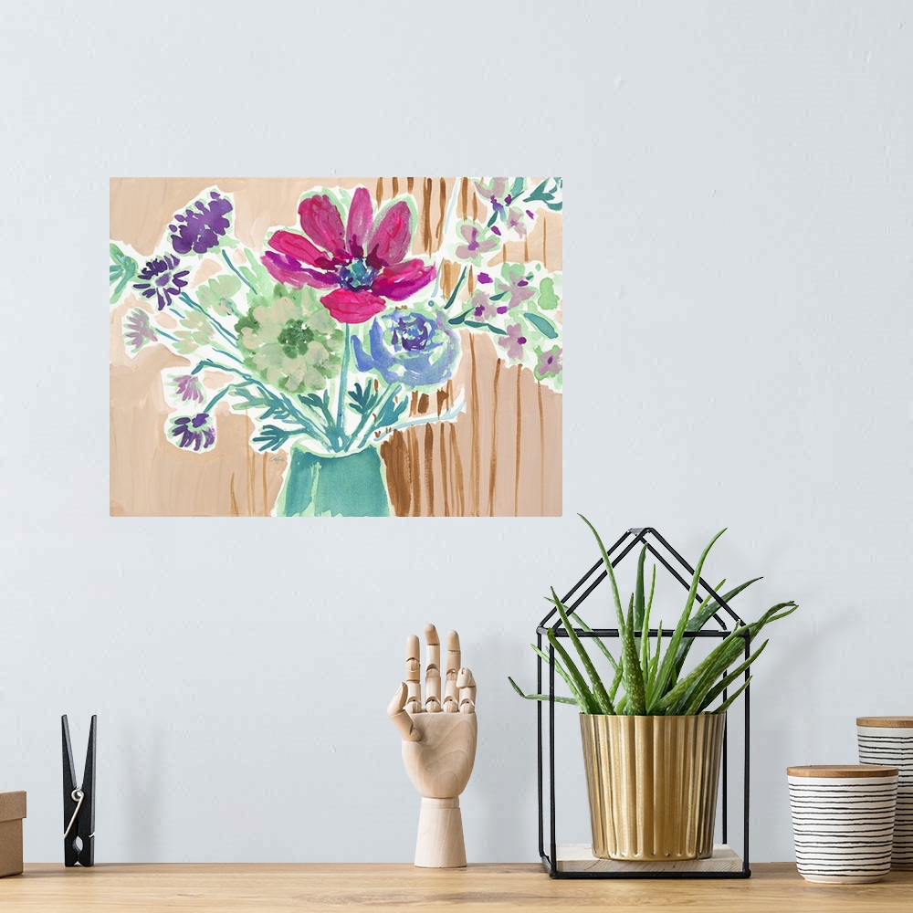 A bohemian room featuring Watercolor painting of a bouquet of pink, green, and blue flowers on tan.