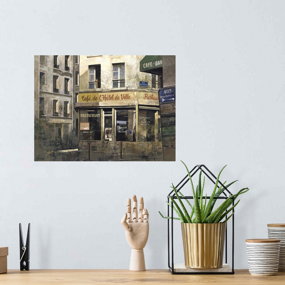 A bohemian room featuring Contemporary painting of a hotel storefront downtown in a city.