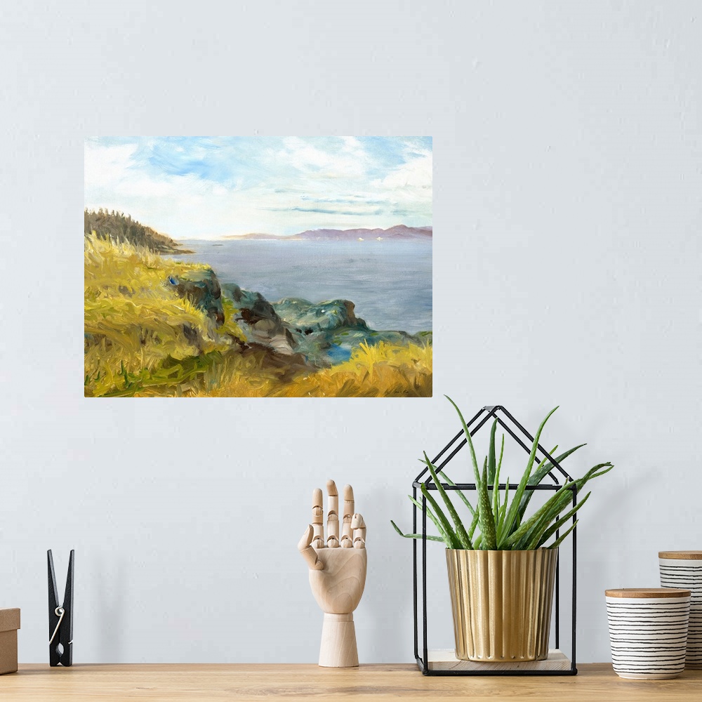 A bohemian room featuring Contemporary artwork of a rocky cliff overlooking the ocean.