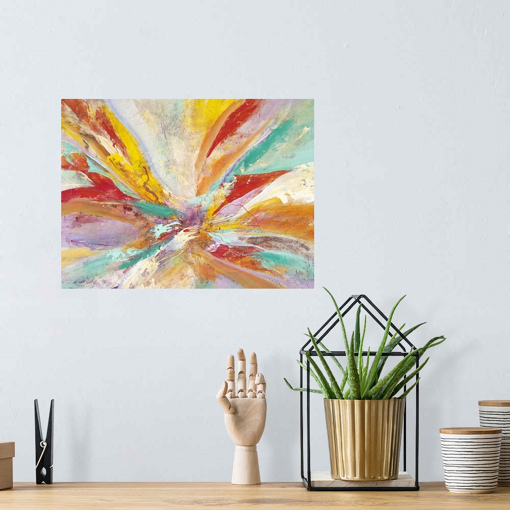 A bohemian room featuring Vibrantly colored contemporary abstract art with radiating red, teal, and orange colors.