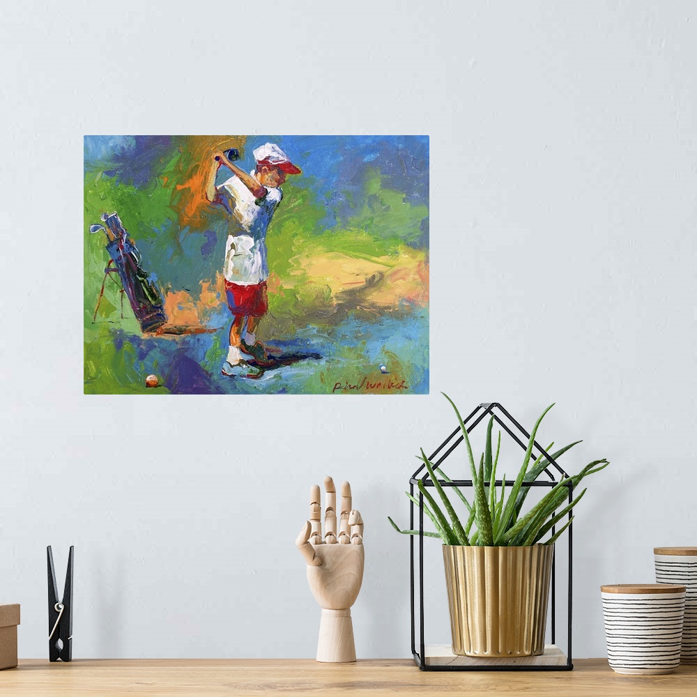 A bohemian room featuring A young boy swinging at the golf ball.