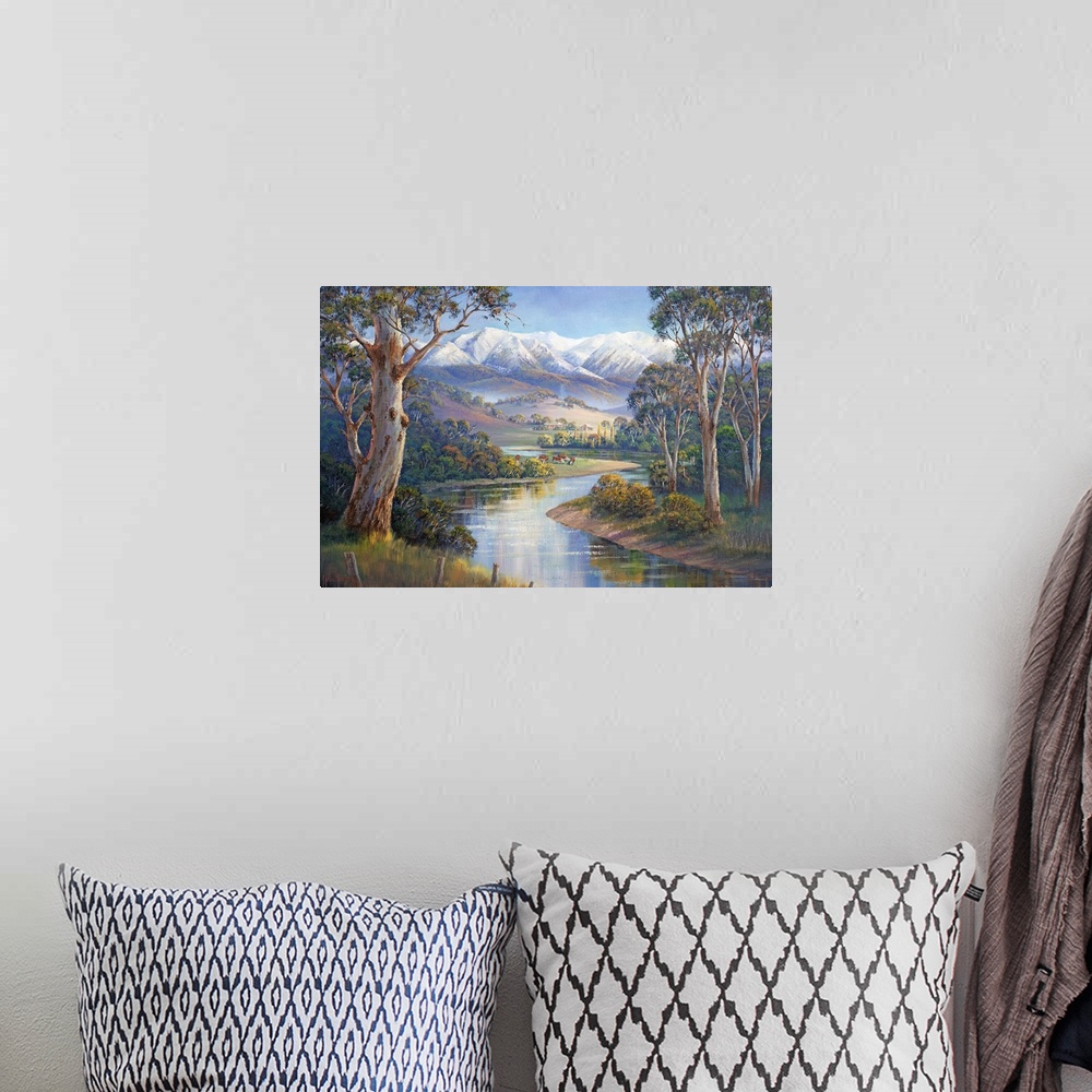 A bohemian room featuring Contemporary painting of an idyllic river valley scene.