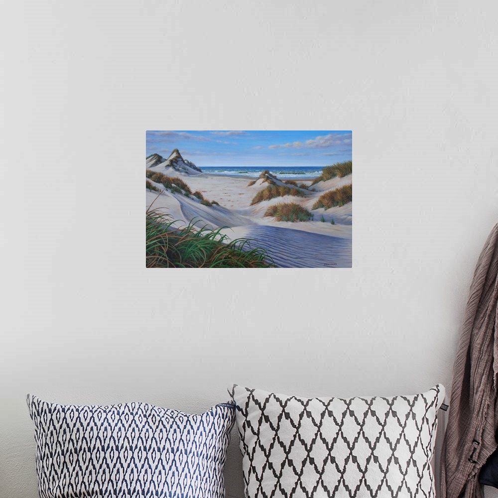 A bohemian room featuring Contemporary artwork of several grassy sand dunes on the beach.