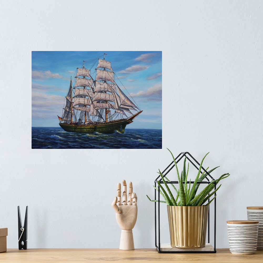 A bohemian room featuring Contemporary artwork of a large ship with several sails on the ocean.
