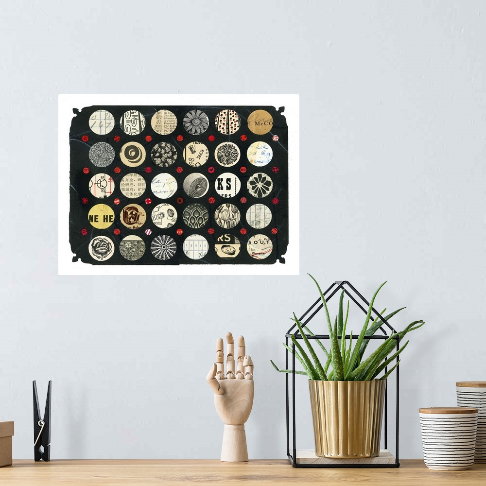A bohemian room featuring Mixed media abstract artwork featuring a collection of circular elements.