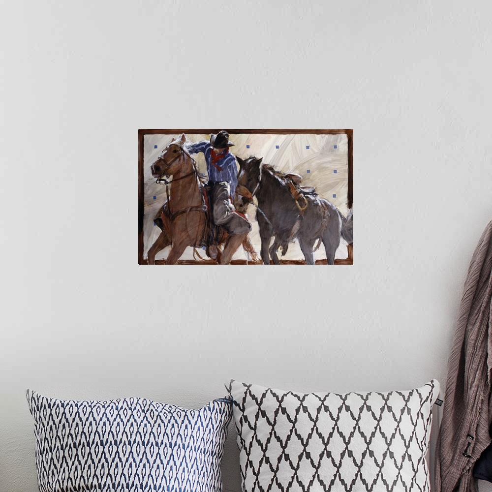 A bohemian room featuring Contemporary western theme painting of a cowboy on horseback, lassoing another horse.