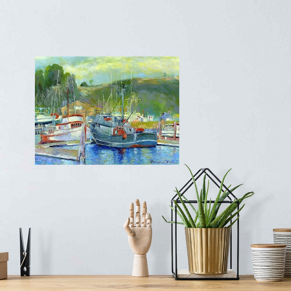 A bohemian room featuring Harbor filled with fishing boats.
