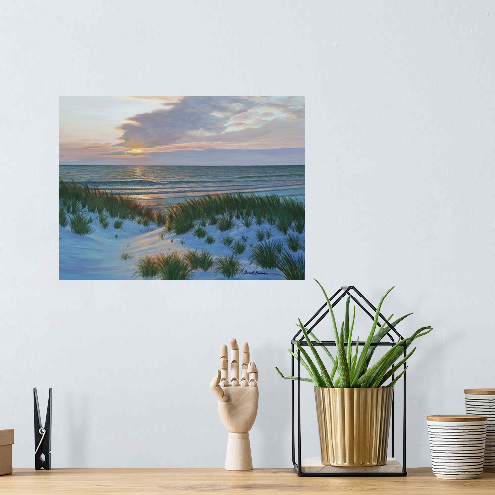 A bohemian room featuring Contemporary painting of the sun setting across the ocean and sand dunes with beach grass.