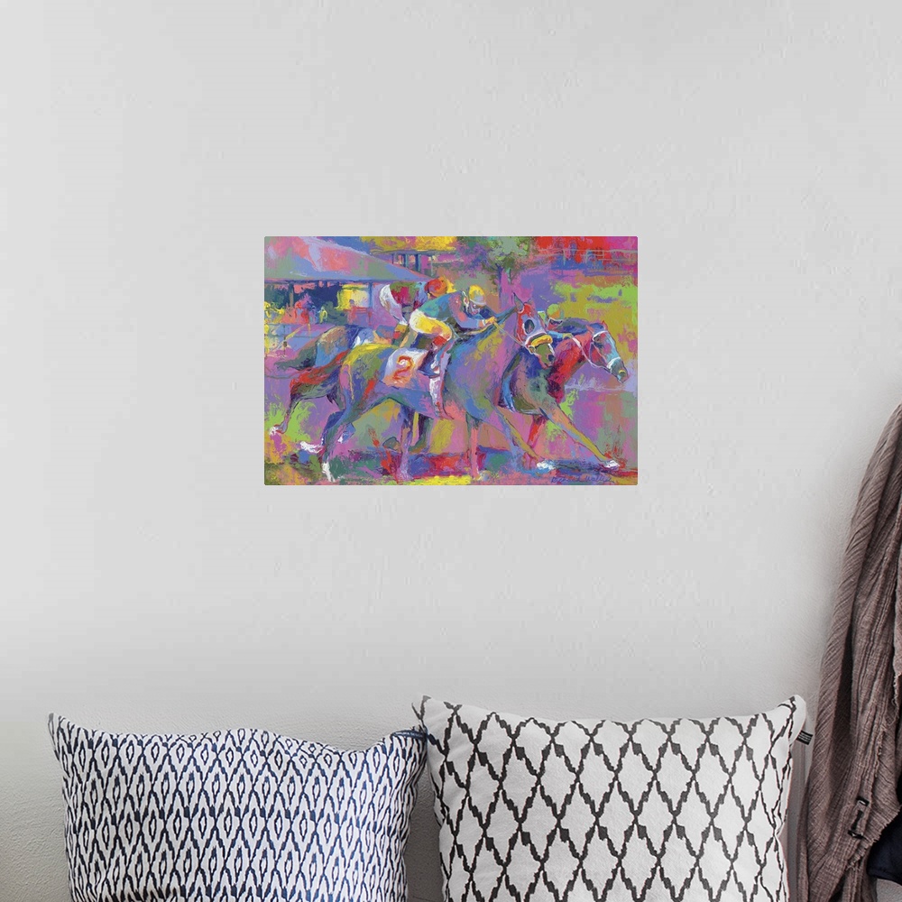 A bohemian room featuring Colorful vibrant painting of jockey's riding horses in a race.