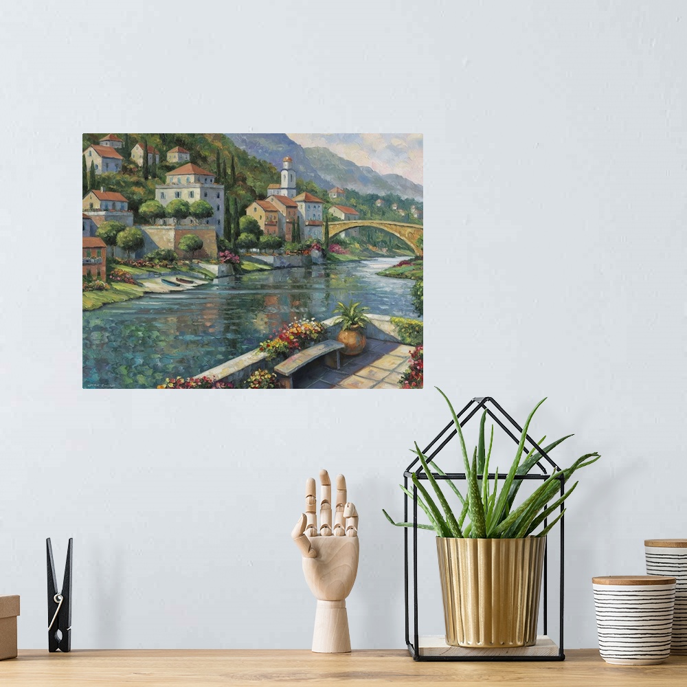 A bohemian room featuring Italian town set on the river