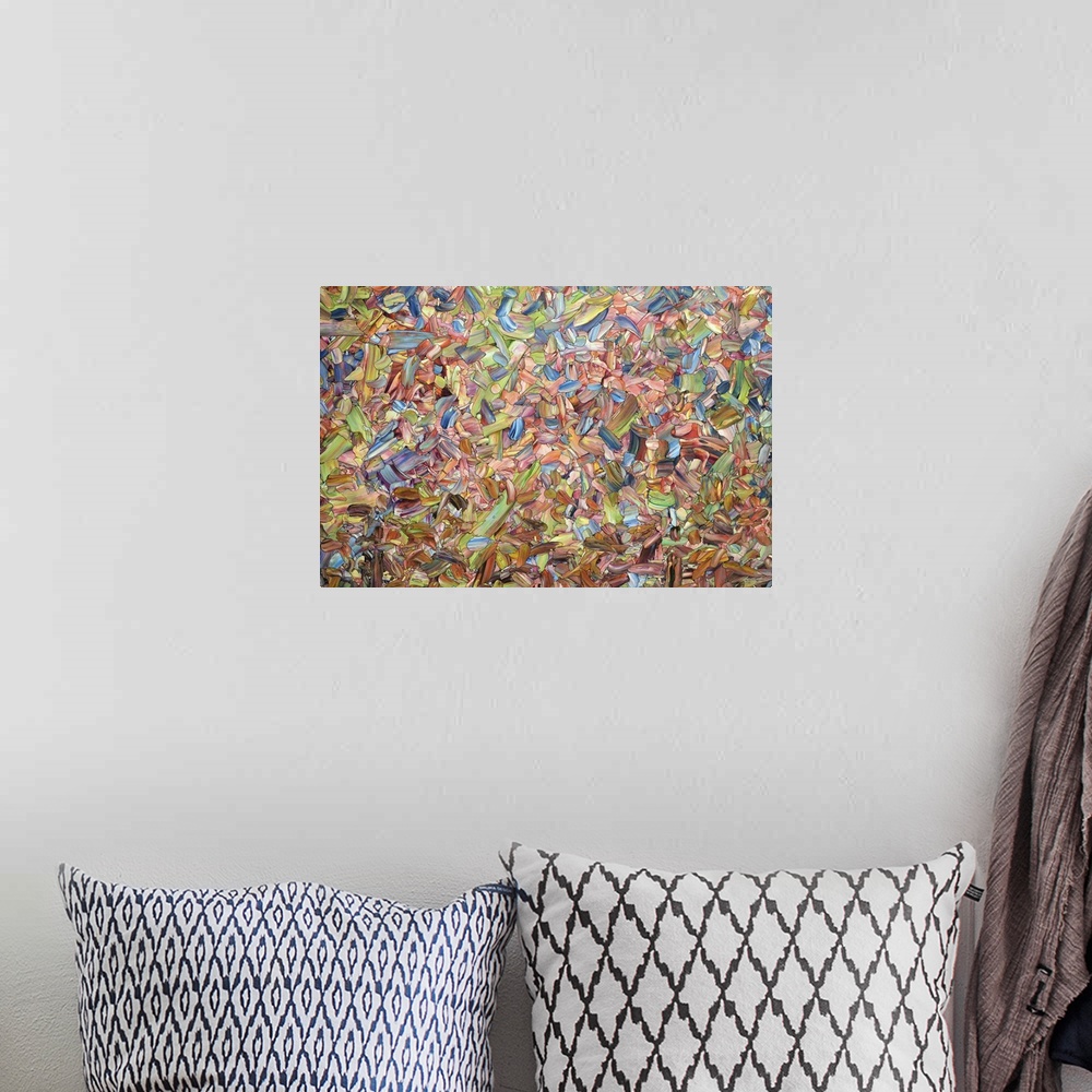 A bohemian room featuring Abstract artwork made of streaks and splatters, in warm summer tones.