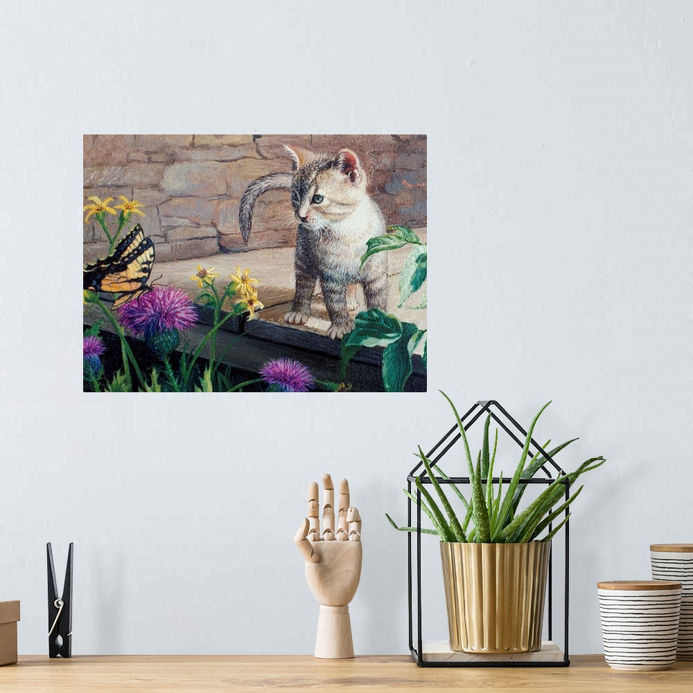 A bohemian room featuring Contemporary artwork of a kitten looking at a butterfly.