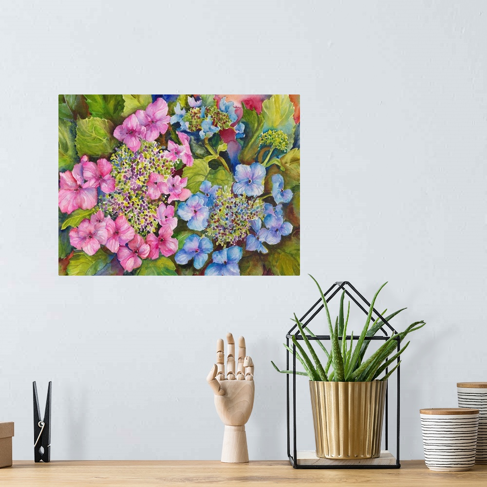 A bohemian room featuring Colorful contemporary painting of pink and blue hydrangeas.