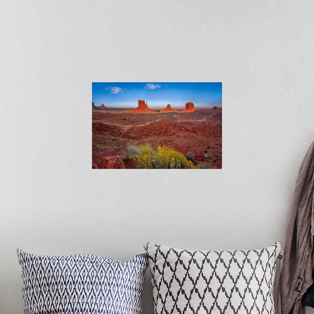 A bohemian room featuring Monument Valley