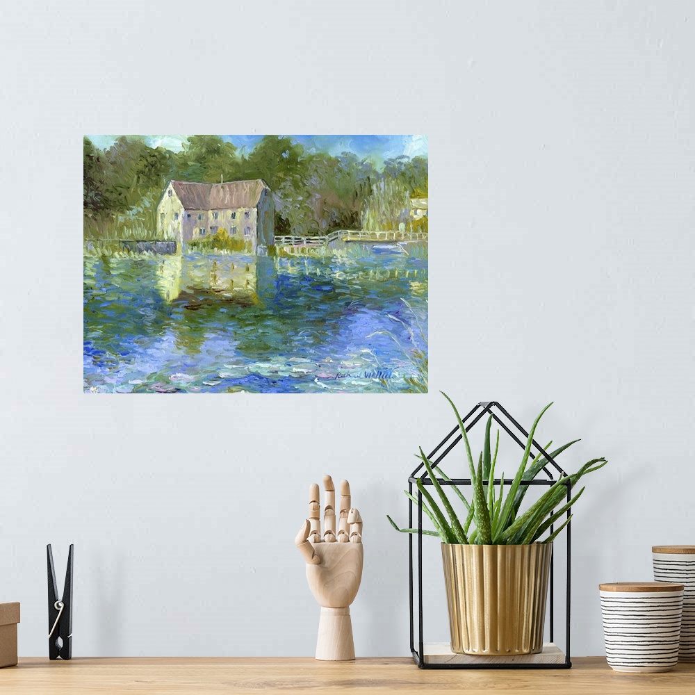 A bohemian room featuring Old mill on pond.