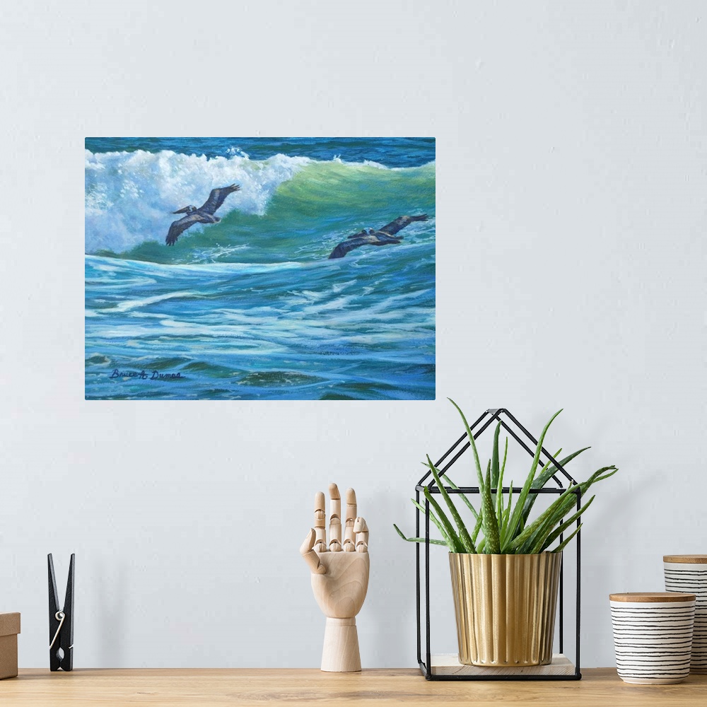 A bohemian room featuring Contemporary painting of two pelicans soaring over a wave about to crash in the ocean.
