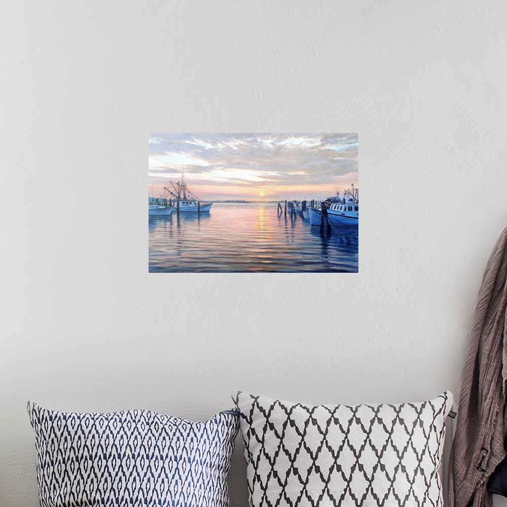 A bohemian room featuring Contemporary artwork of a harbor full of docked boats at sunset.