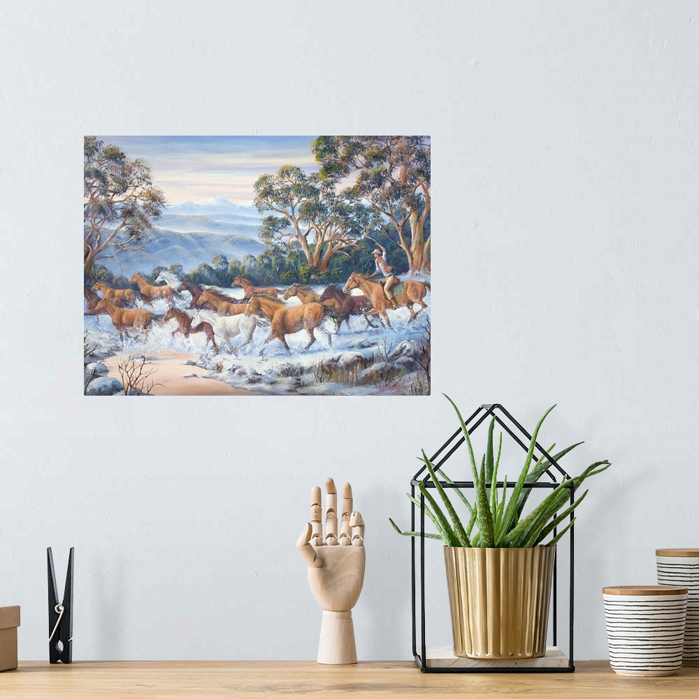 A bohemian room featuring Contemporary painting of a herd of horse running wildly through a river in winter.