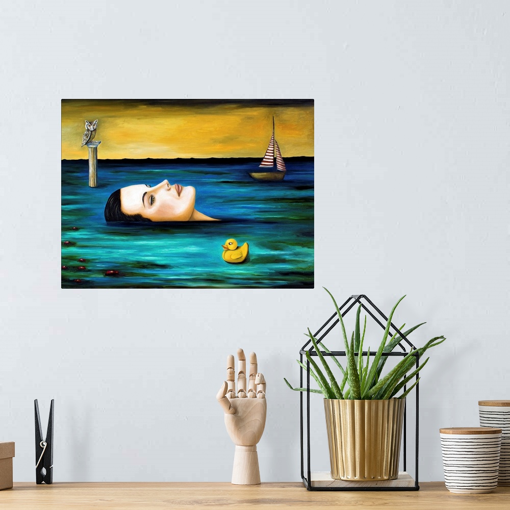 A bohemian room featuring Surrealist painting of a woman floating in dark water with a sailboat in the distance.
