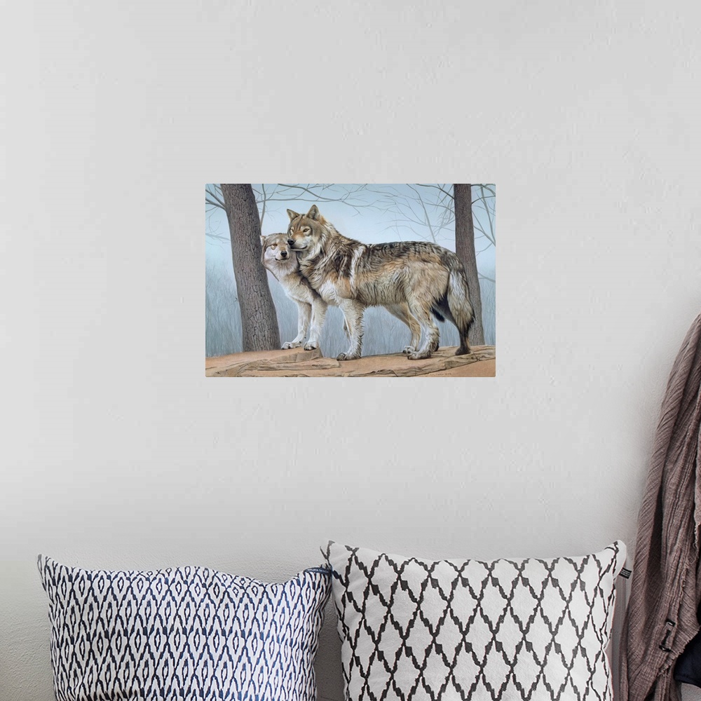 A bohemian room featuring Two wolves standing next to each other on a ledge with a tree in front and in back of them.