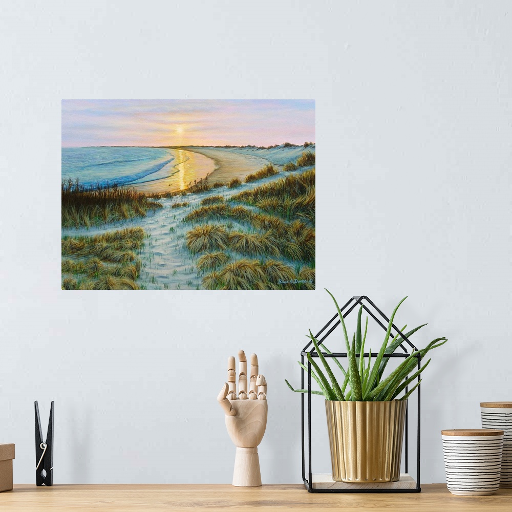 A bohemian room featuring Contemporary artwork of a beach and ocean scene at sunset.
