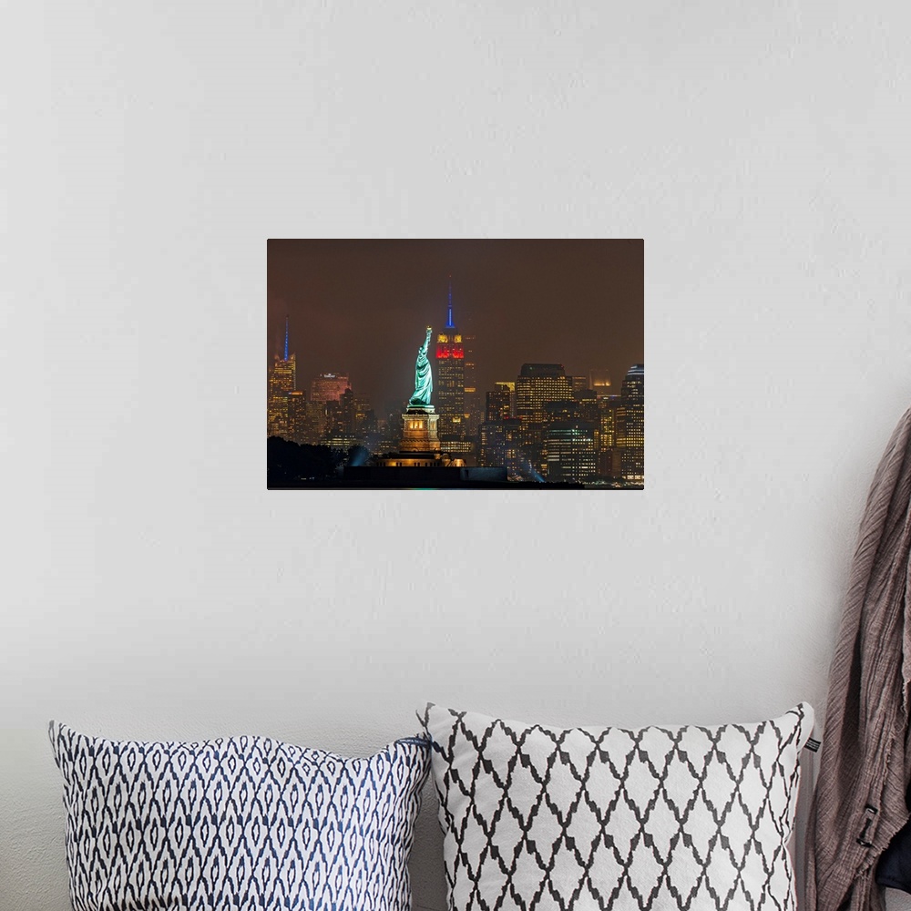 A bohemian room featuring Statue Of Liberty And Empire State Buillding At Night