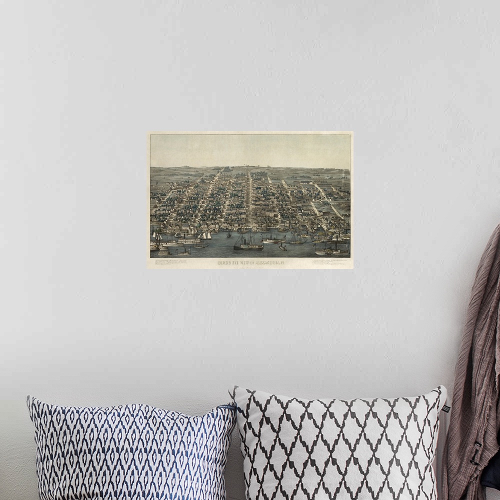 A bohemian room featuring An antiqued illustrated map of Alexandria printed on canvas.