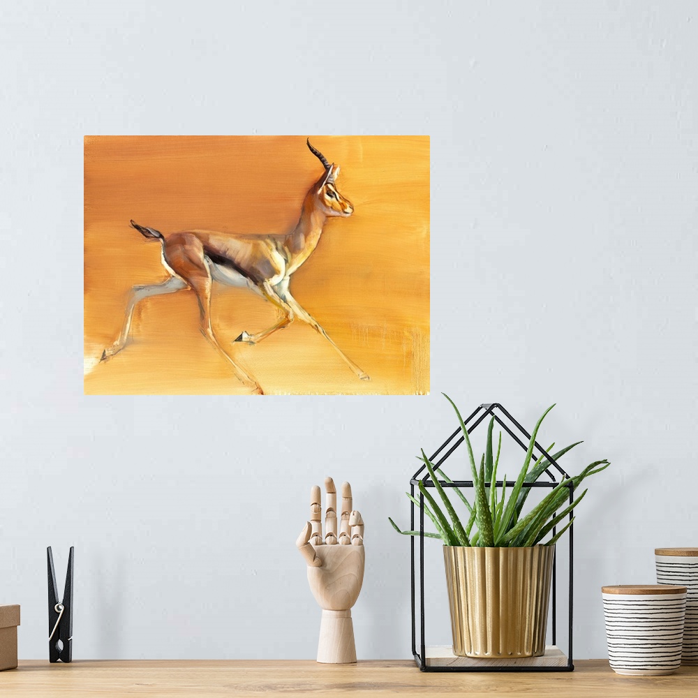 A bohemian room featuring Contemporary wildlife painting of an Arabian Gazelle in the desert.