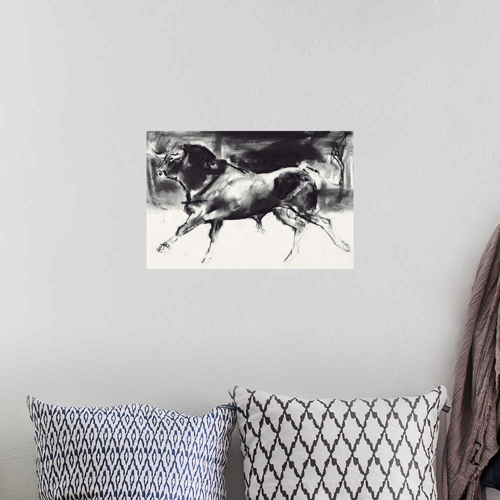A bohemian room featuring Contemporary painting of a large bull running.