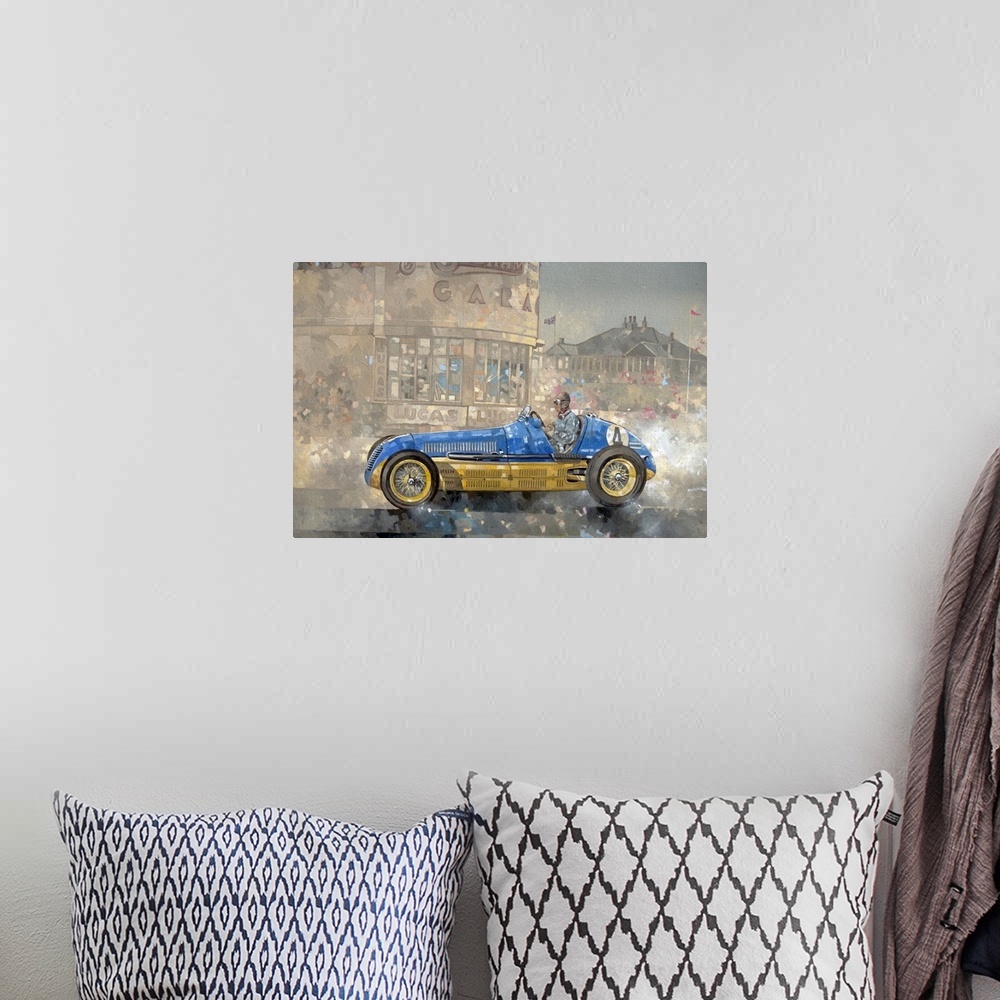 A bohemian room featuring Contemporary oil painting of a race car driver in a vintage Maserati against a softened background.